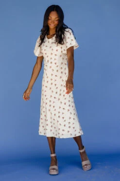 Sacia Flutter Sleeve Dress - Elegant Cream Floral Print